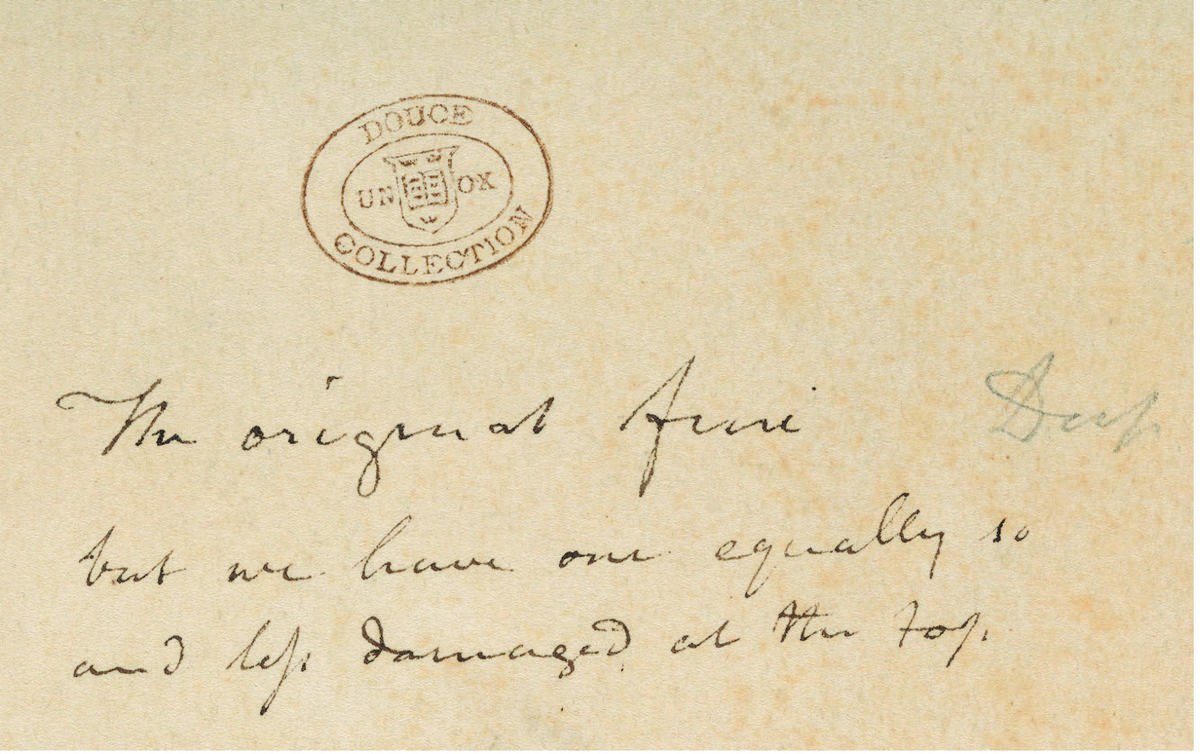 Inscription written in script on a cream background.